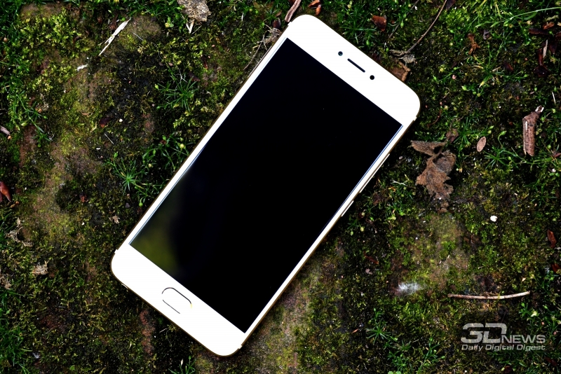  Meizu Pro 6, фронтальная панель: под экраном кнопка &laquo;Домой&raquo; со сканером отпечатков пальцев, над экраном &ndash; разговорный динамик, фронтальная камера и датчик освещенности 